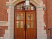 Collegiate-gothic style door surround.